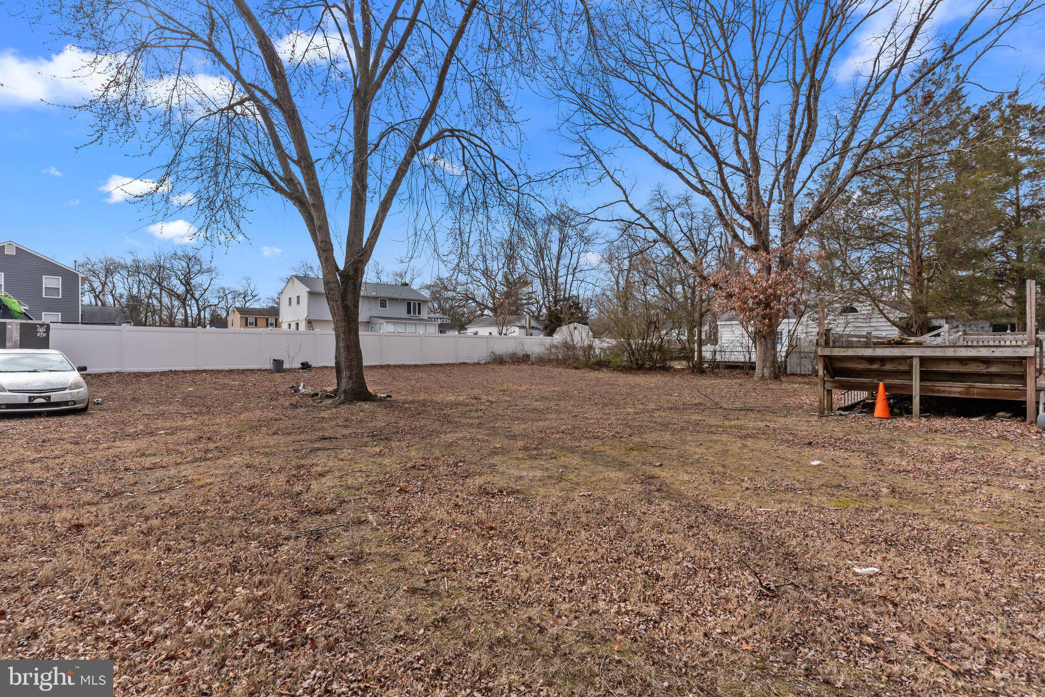 52 East 9th Avenue Pine Hill, NJ 08021 - Photo 20 of 25 a view of house with outdoor space and trees