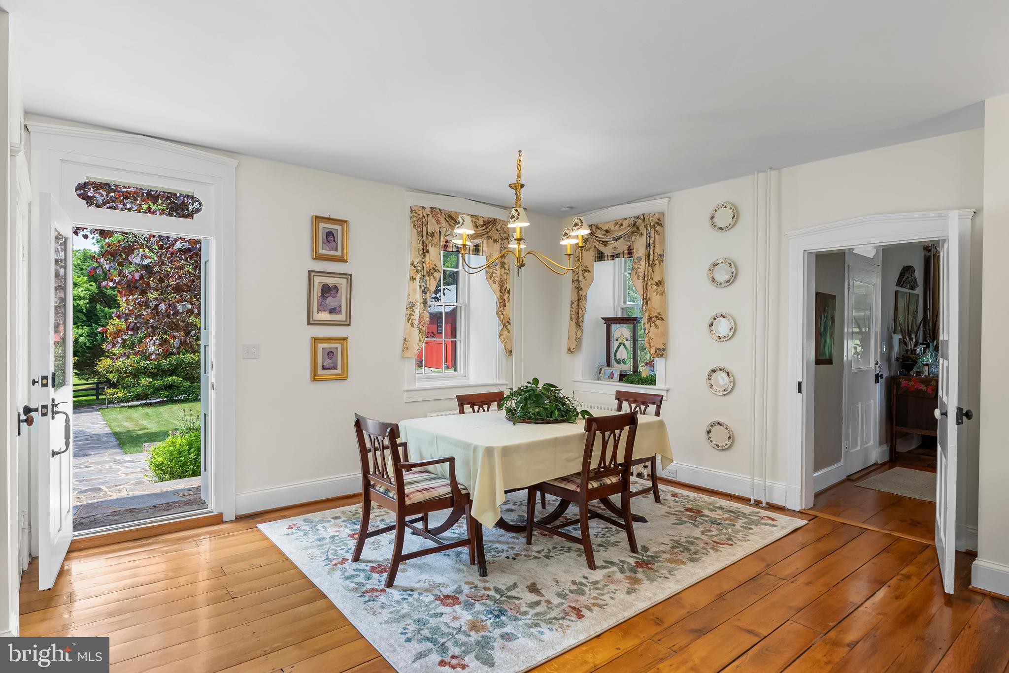 2810 Hoffman Mill Road Hampstead, MD 21074 - Photo 19 of 121 a view of a dining room with furniture window and wooden floor