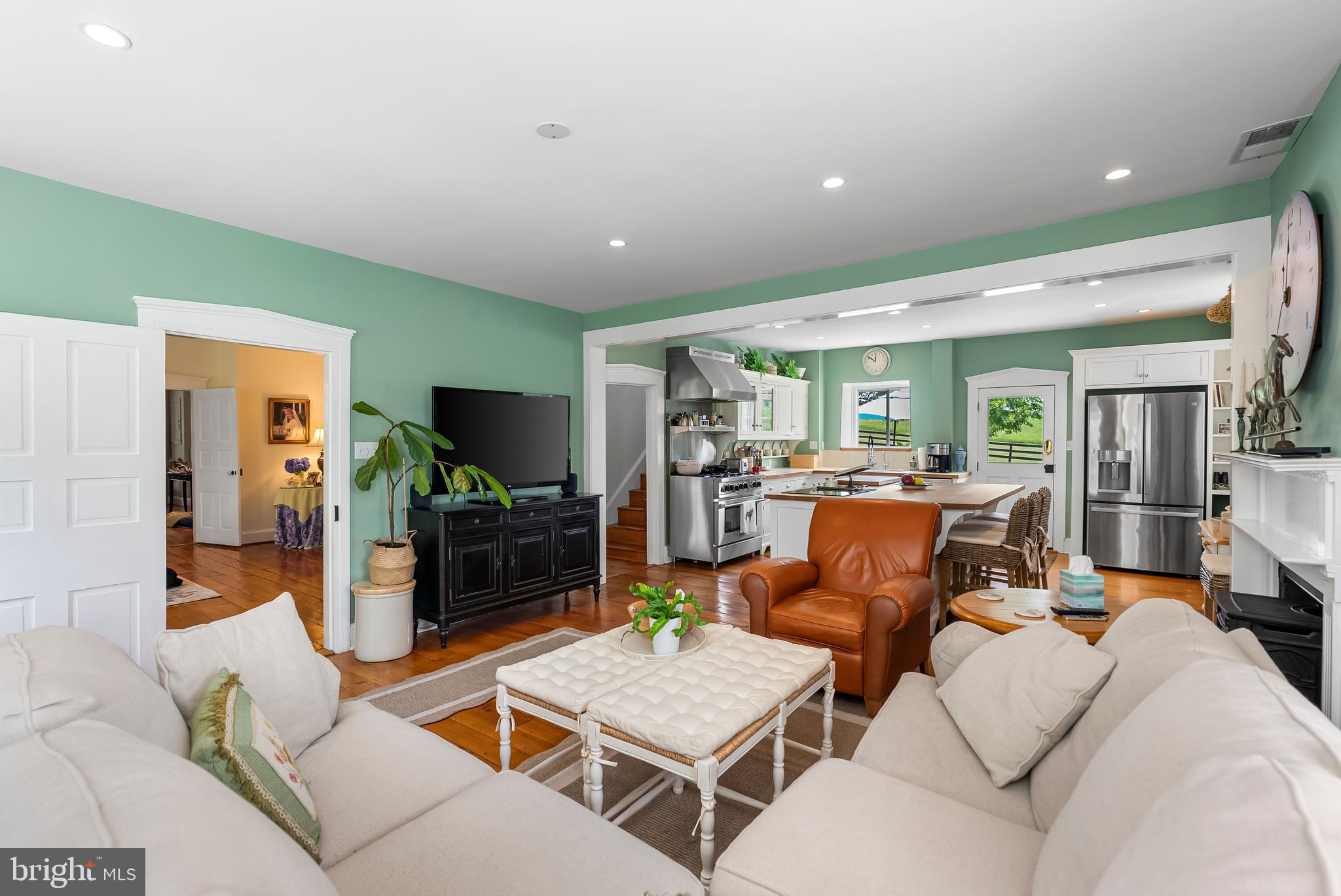 2810 Hoffman Mill Road Hampstead, MD 21074 - Photo 23 of 121 a living room with furniture and a flat screen tv