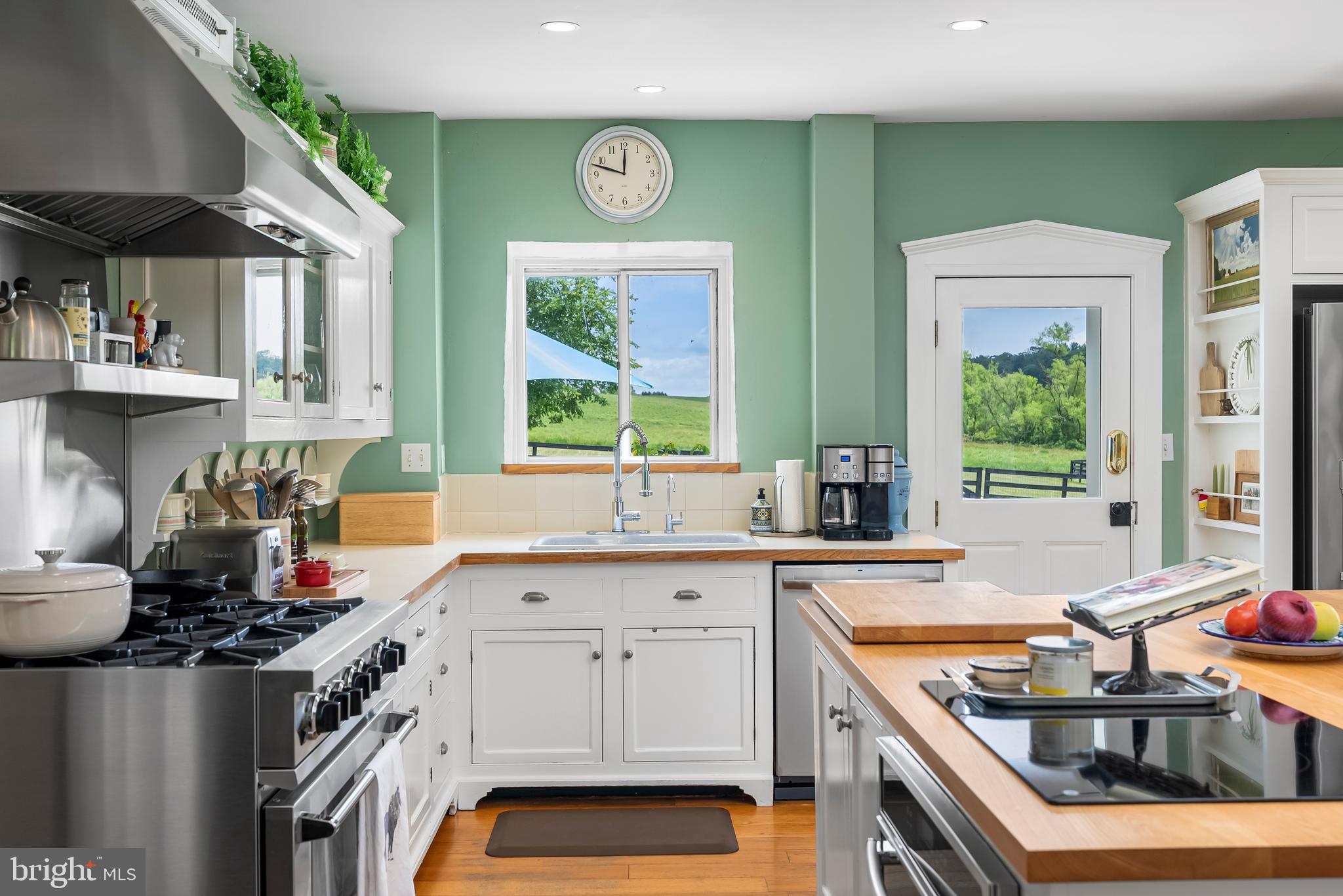 2810 Hoffman Mill Road Hampstead, MD 21074 - Photo 26 of 121 a kitchen with stainless steel appliances granite countertop a sink stove and cabinets