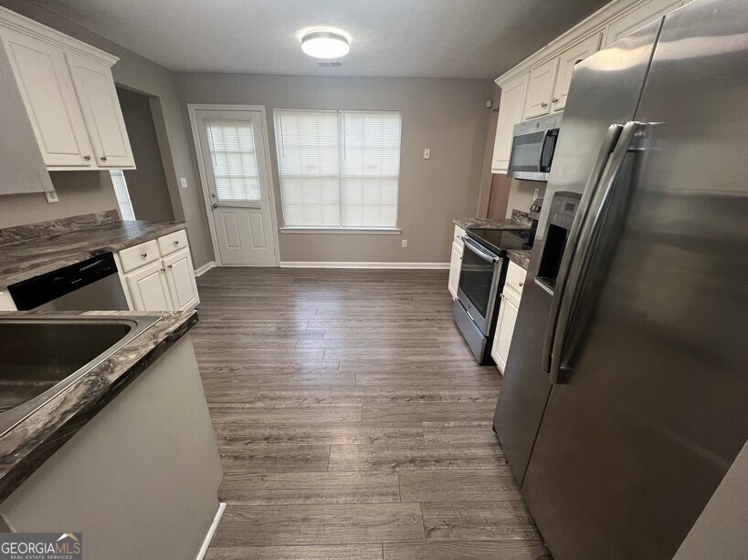 70 Princeton Way Covington, GA 30016 - Photo 12 of 32 a view of a kitchen with a sink