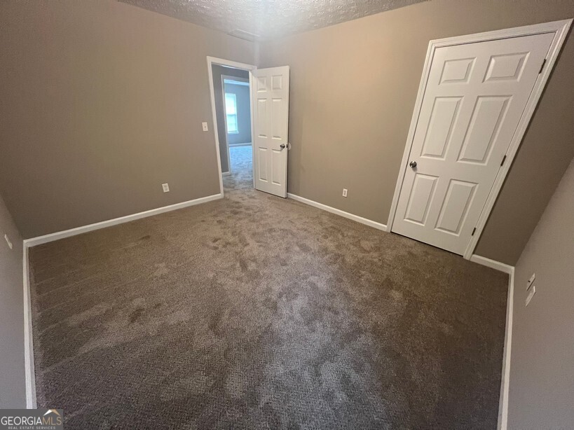 70 Princeton Way Covington, GA 30016 - Photo 22 of 32 a view of an empty room