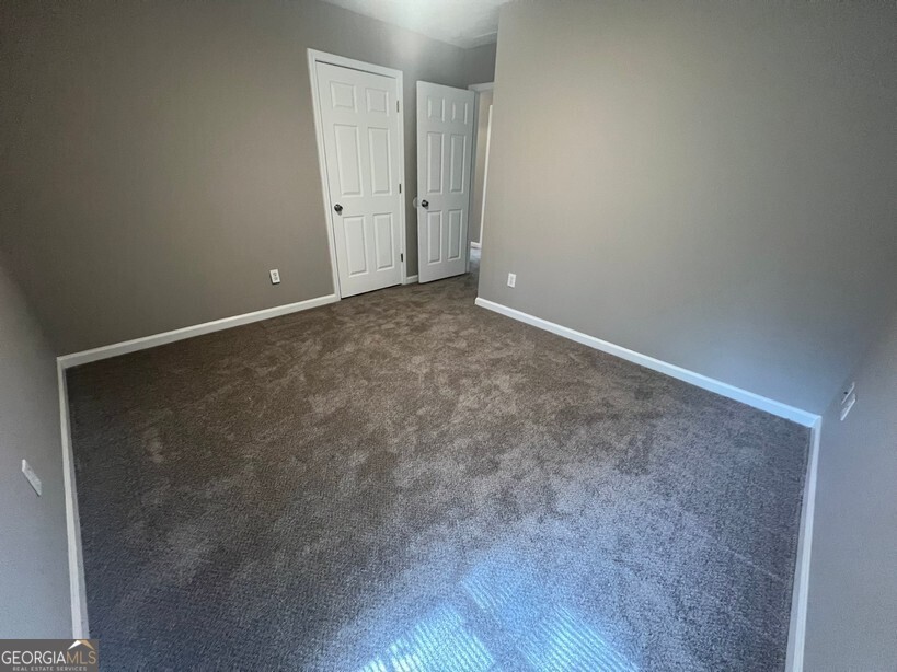70 Princeton Way Covington, GA 30016 - Photo 24 of 32 a view of an empty room