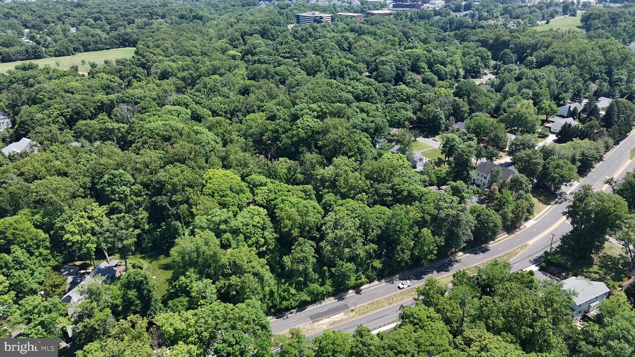 6577 Braddock Road Alexandria, VA 22312 - Photo 9 of 12 an aerial view of a house with a yard