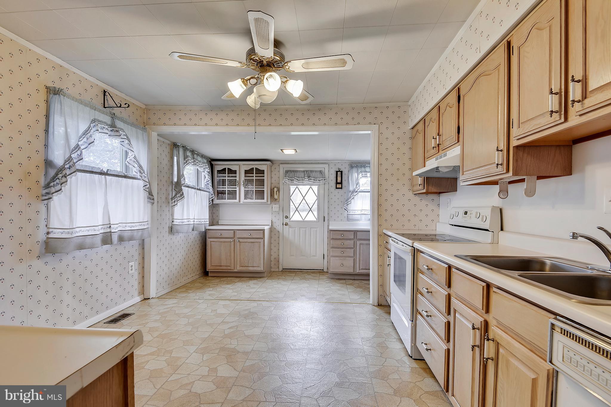 19 Compression Court Baltimore, MD 21220 - Photo 8 of 25 Kitchen - it's enormous, table goes on the left