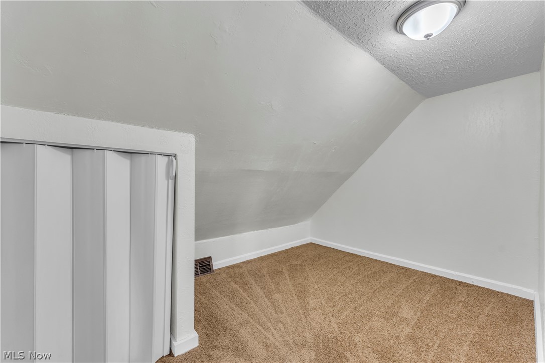 12905 Watterson Avenue Cleveland, OH 44105 - Photo 24 of 30 Bonus room with carpet floors and baseboards