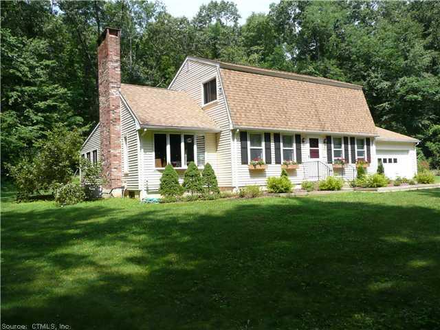 76 Lawton Road Canton, CT 06019 - Photo 1 of 1 a view of a house with a yard and a garden