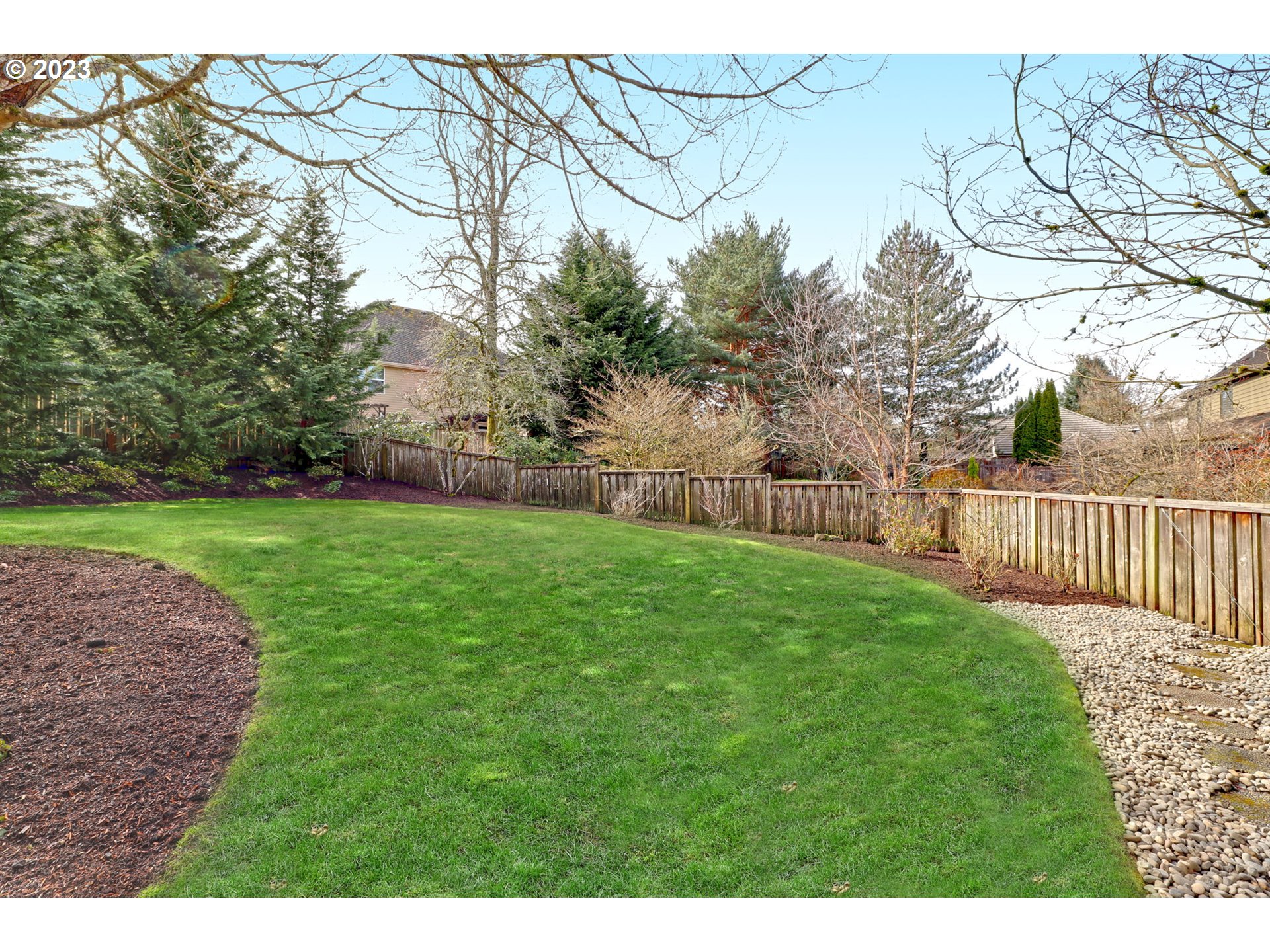 3566 Northwest Bronson Crest Loop Portland, OR 97229 - Photo 30 of 31 a view of a yard with large trees