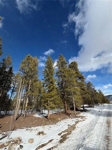 a view of a road with a building in the background