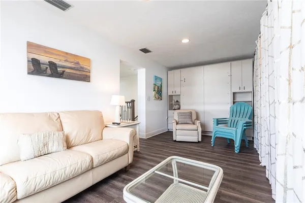 a living room with furniture and a couch