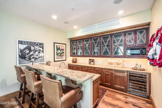 a bedroom with a bed and a television