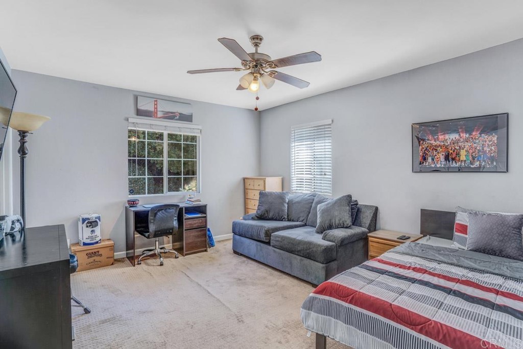 441 Bougher Road San Marcos, CA 92069 - Photo 17 of 39 a bedroom with furniture and a window