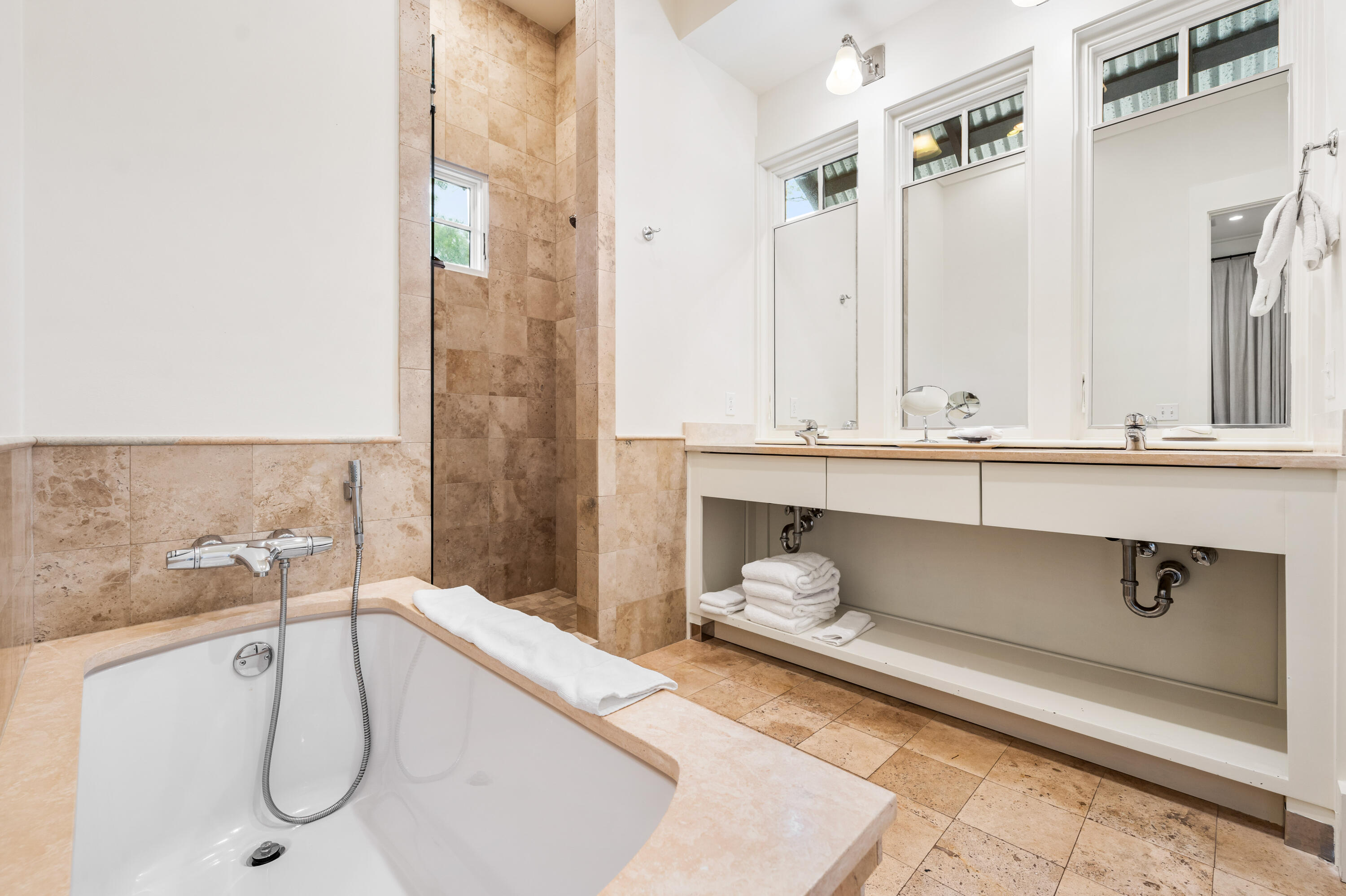 36 Town Hall Road Rosemary Beach, FL 32461 - Photo 20 of 62 a bathroom with a granite countertop sink and a mirror