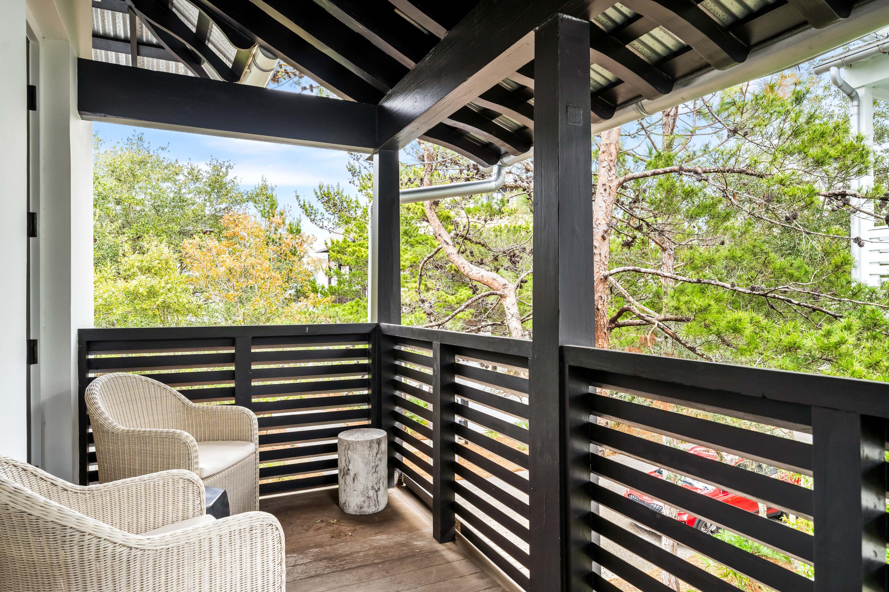 36 Town Hall Road Rosemary Beach, FL 32461 - Photo 24 of 62 a view of a porch with furniture and a gate