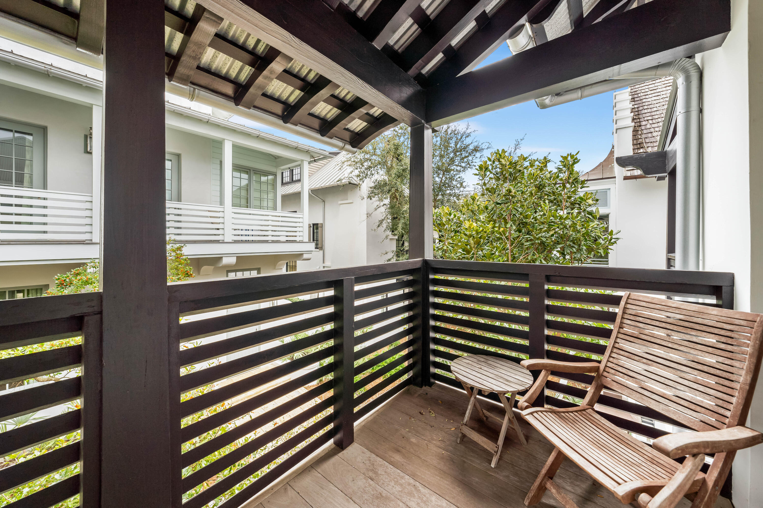 36 Town Hall Road Rosemary Beach, FL 32461 - Photo 26 of 62 a view of a back yard from a balcony