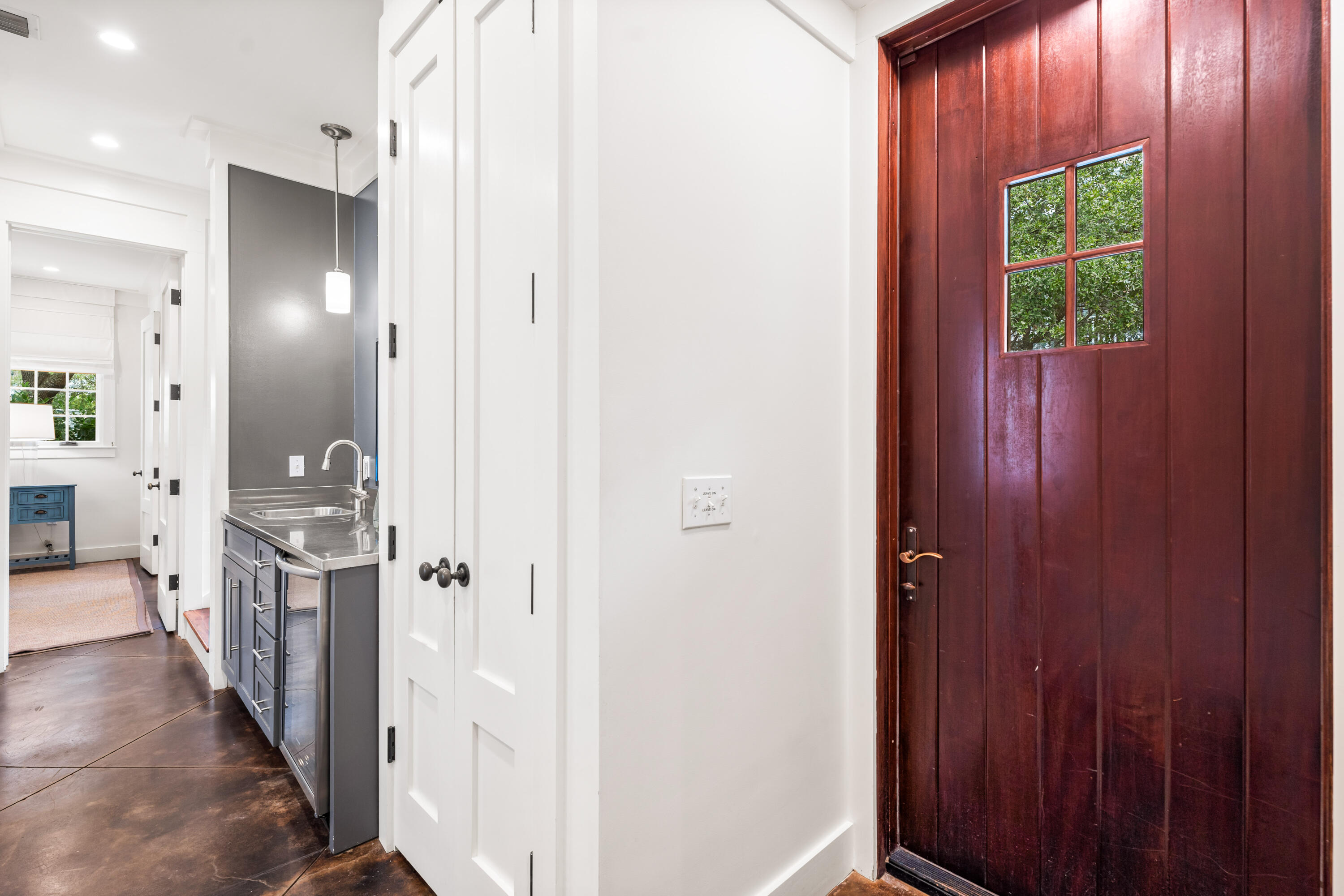 36 Town Hall Road Rosemary Beach, FL 32461 - Photo 30 of 62 a view of a hallway with a door and stairs