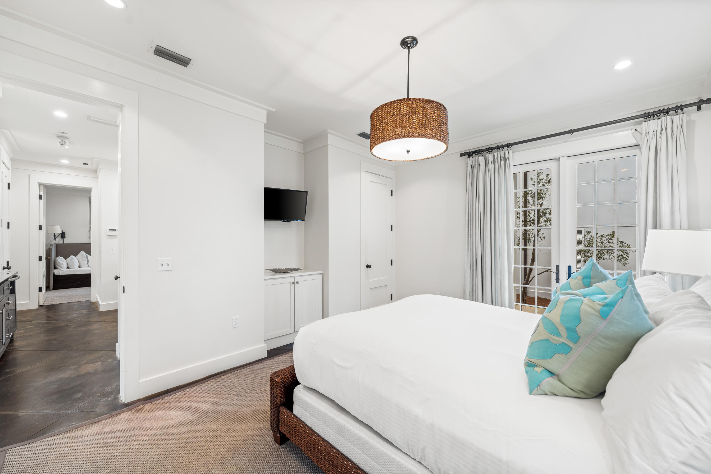 36 Town Hall Road Rosemary Beach, FL 32461 - Photo 36 of 62 a bedroom with a bed and a chandelier