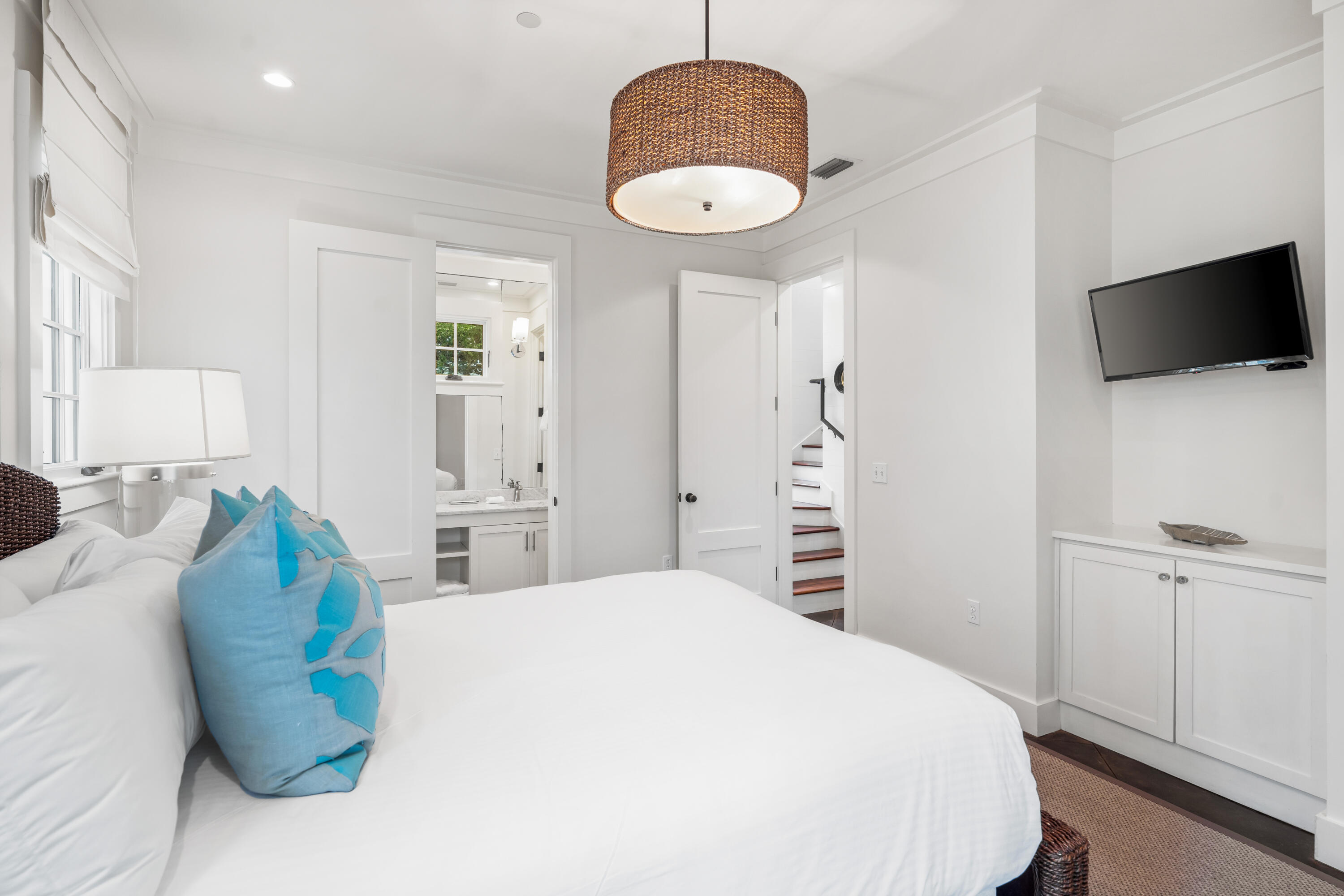 36 Town Hall Road Rosemary Beach, FL 32461 - Photo 37 of 62 a bedroom with a bed and a television