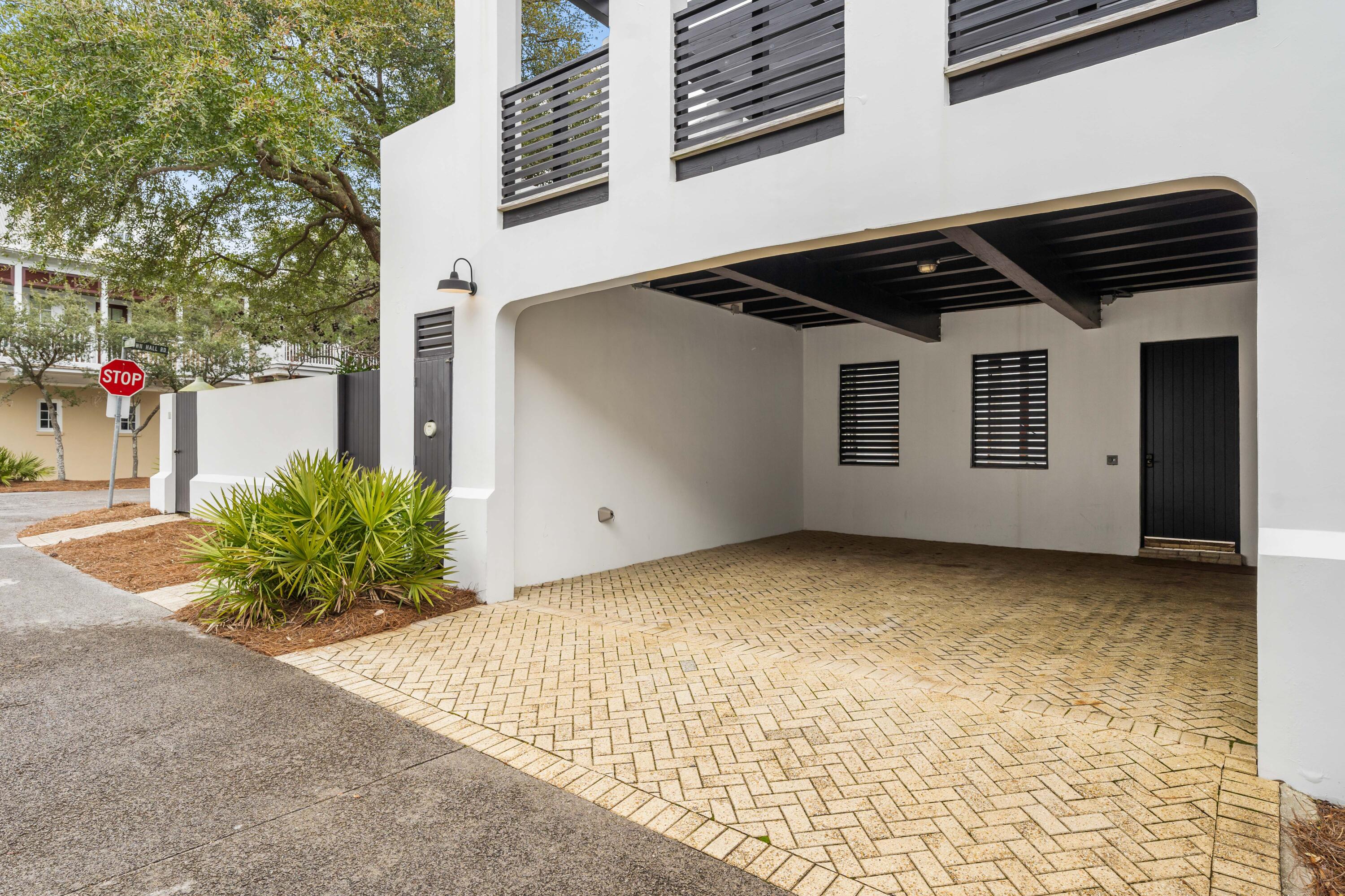 36 Town Hall Road Rosemary Beach, FL 32461 - Photo 45 of 62 a backyard of a house