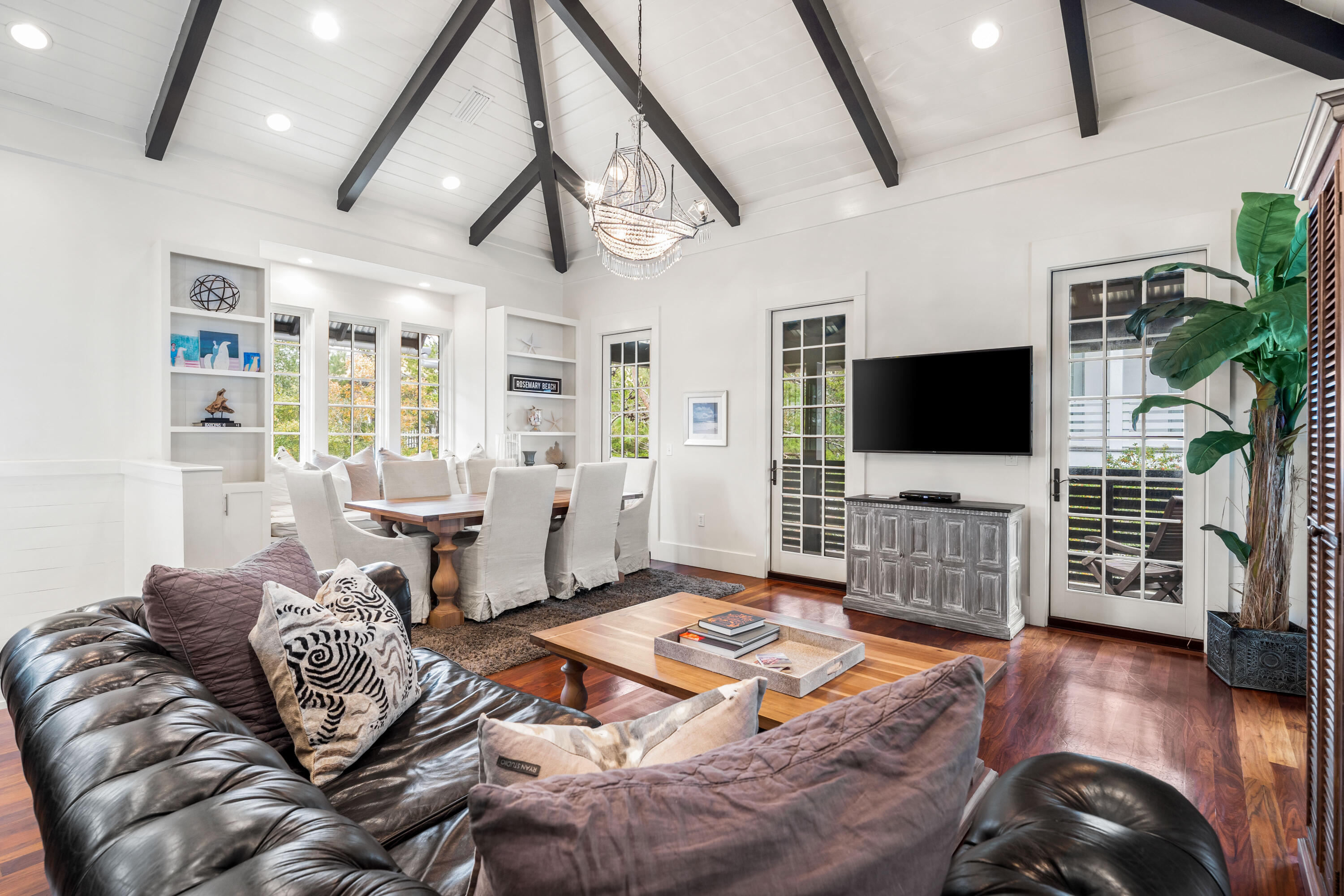 36 Town Hall Road Rosemary Beach, FL 32461 - Photo 6 of 62 a living room with furniture and a flat screen tv