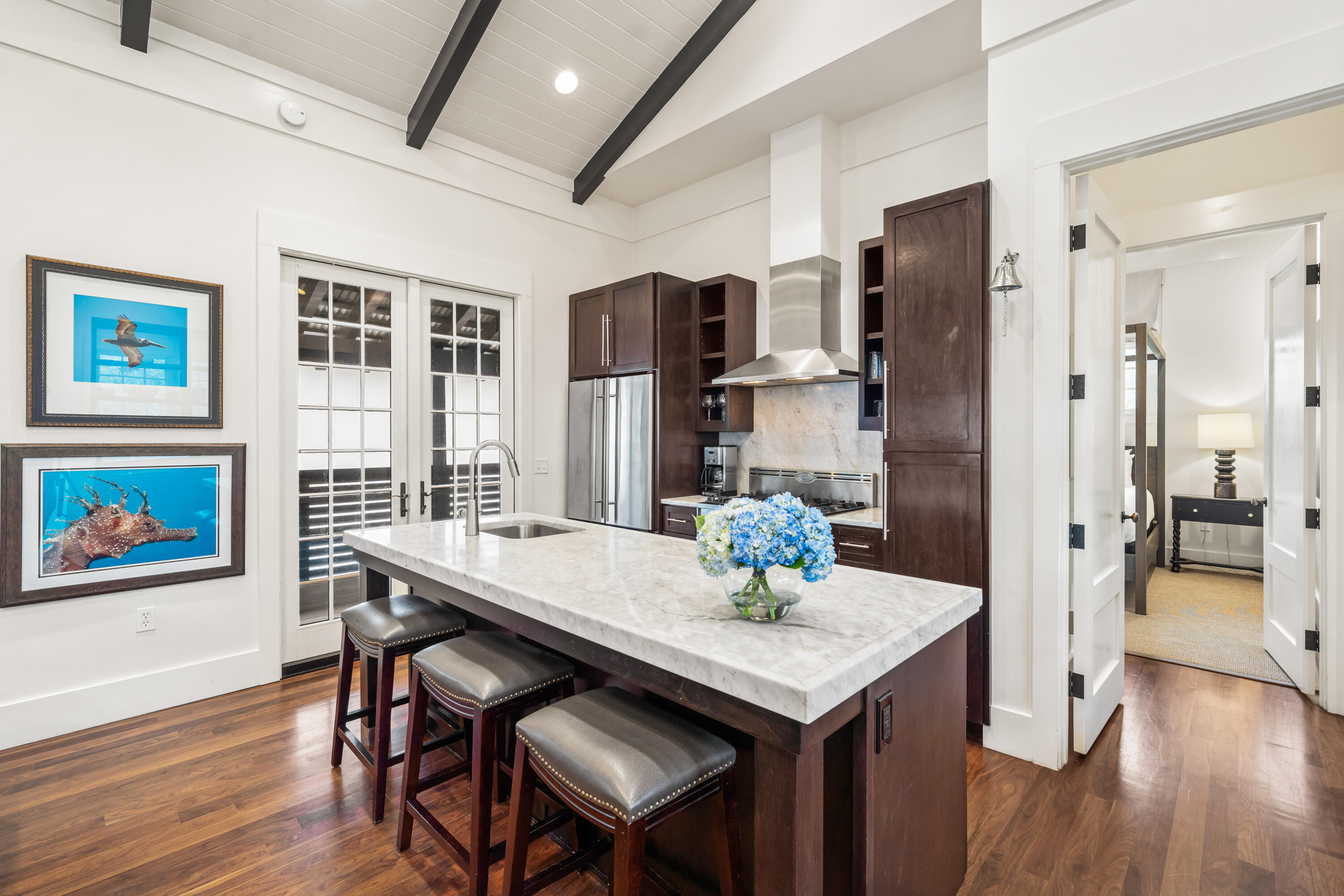 36 Town Hall Road Rosemary Beach, FL 32461 - Photo 8 of 62 a kitchen with a table and chairs