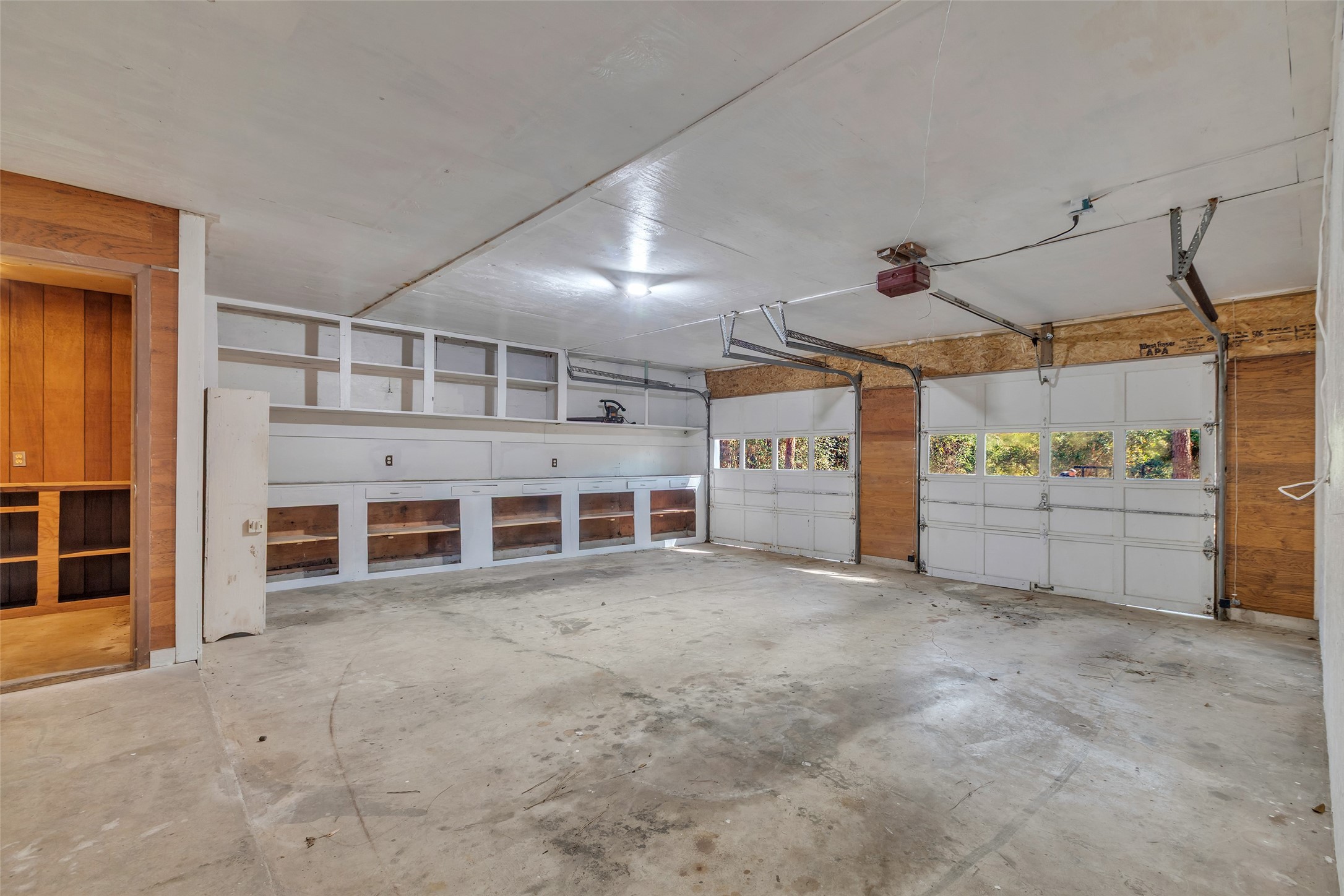 23311 Nichols Sawmill Road Hockley, TX 77447 - Photo 18 of 23 Storage galore in the garage!