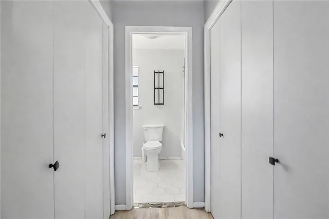 a view of a patio with chair and tables back yard of the house