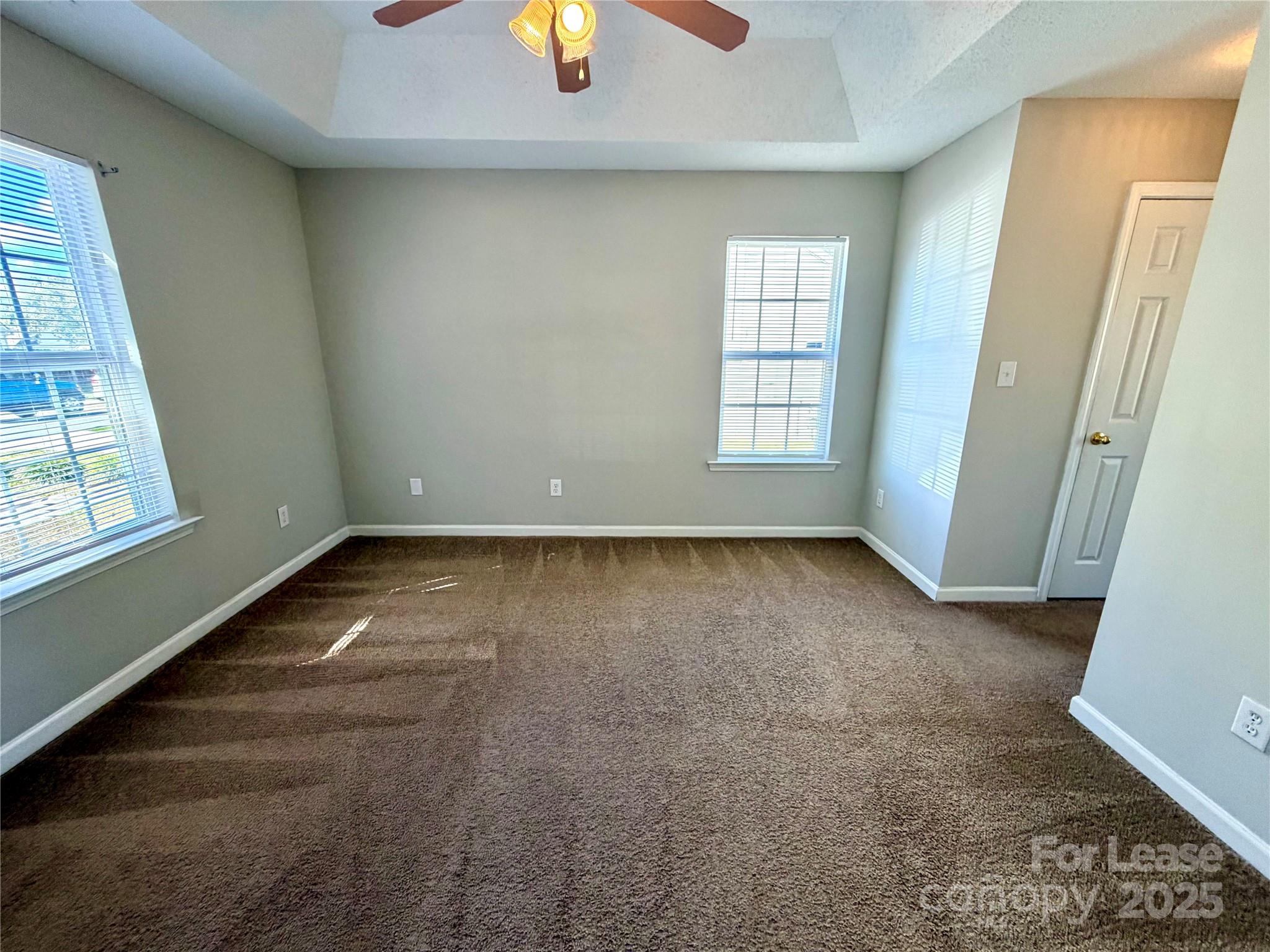 910 Rucker Cliff Drive Charlotte, NC 28214 - Photo 12 of 23 an empty room with windows