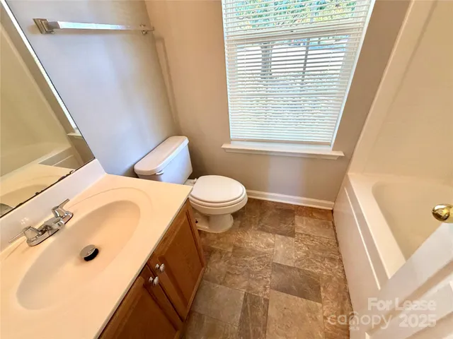 a bathroom with a sink and a toilet