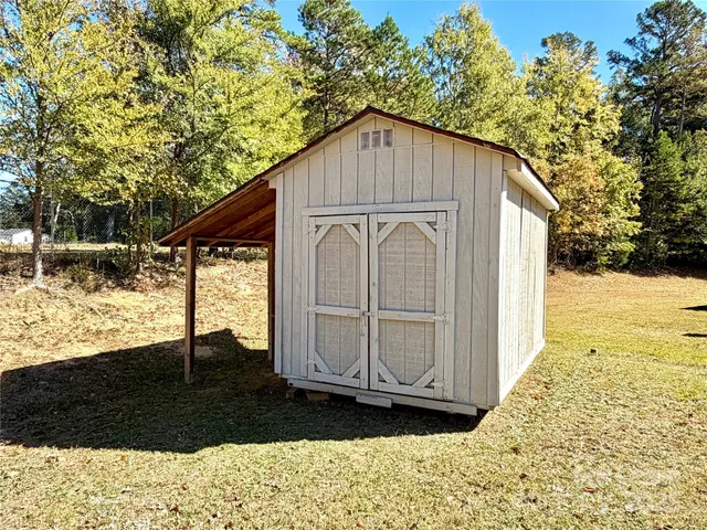 a view of backyard of house