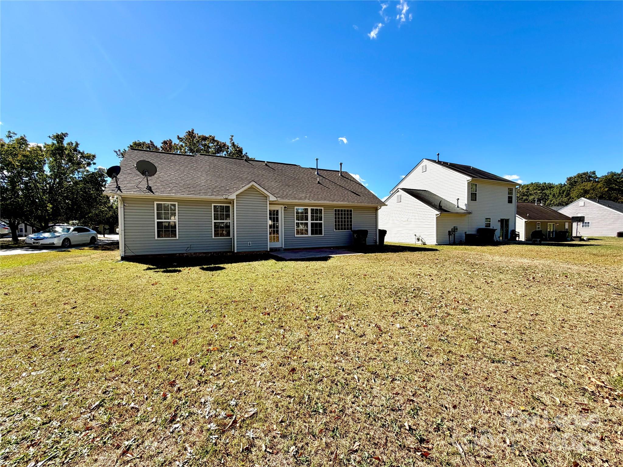910 Rucker Cliff Drive Charlotte, NC 28214 - Photo 23 of 23 a front view of a house with a yard