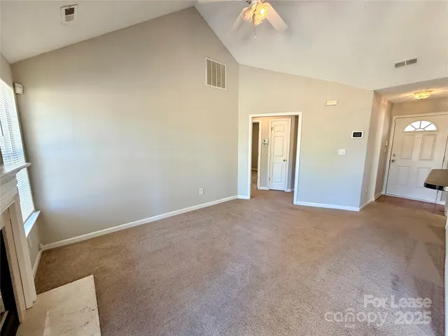 a view of a room with an empty space