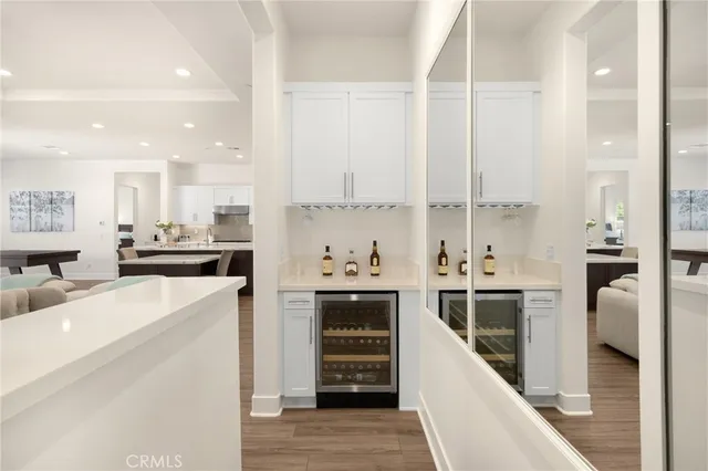 a large kitchen with stainless steel appliances lots of counter top space