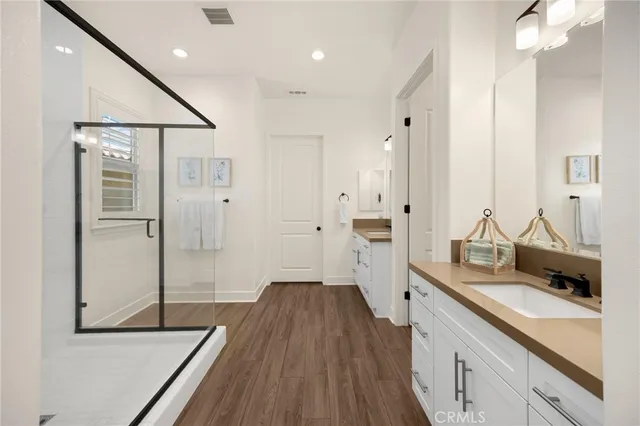 a bedroom with a bed and a table