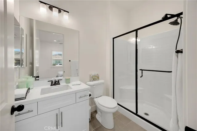a utility room with sink dryer and washer
