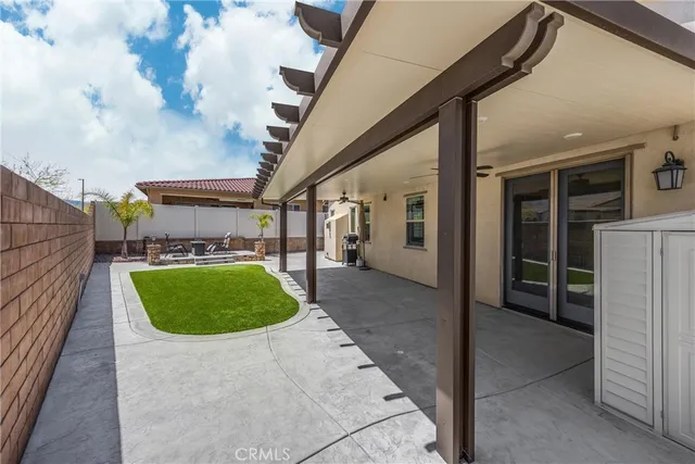an aerial view of a house with a swimming pool
