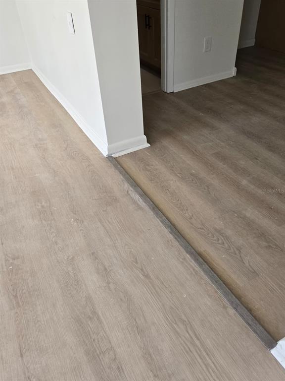 2708 Lion Heart Road Winter Park, FL 32792 - Photo 25 of 47 a view of a room with wooden floor