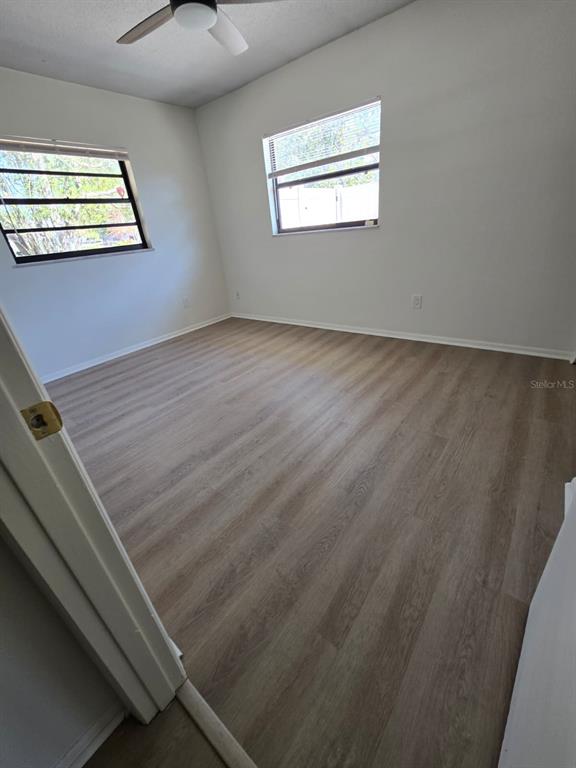 2708 Lion Heart Road Winter Park, FL 32792 - Photo 27 of 47 a view of a room with wooden floor and window