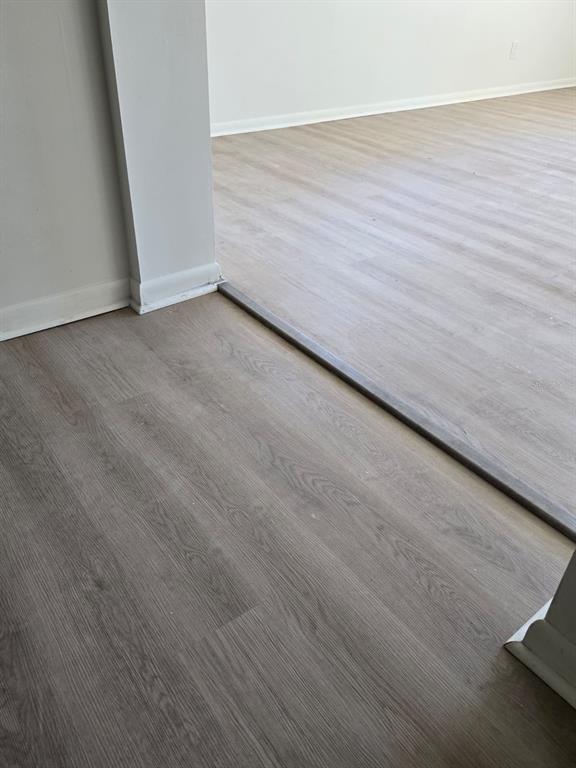 2708 Lion Heart Road Winter Park, FL 32792 - Photo 29 of 47 a view of an empty room and wooden floor