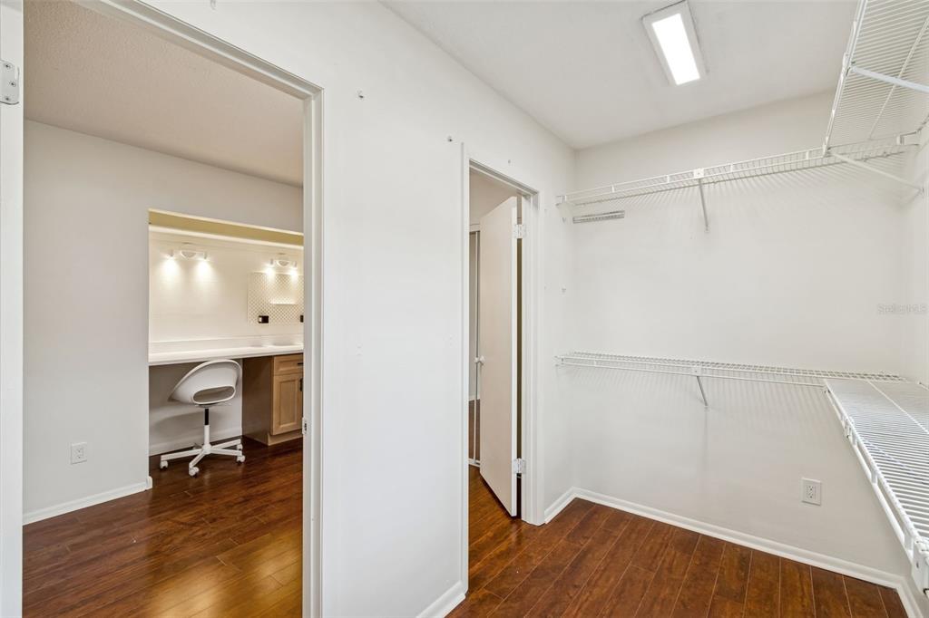 2708 Lion Heart Road Winter Park, FL 32792 - Photo 39 of 47 a view of a room with wooden floor cabinet and a bathroom