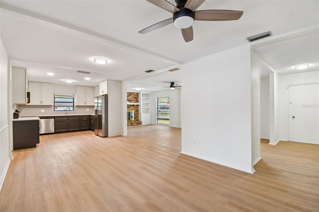 2708 Lion Heart Road Winter Park, FL 32792 - Photo 7 of 47 a view of kitchen and kitchen with wooden floor