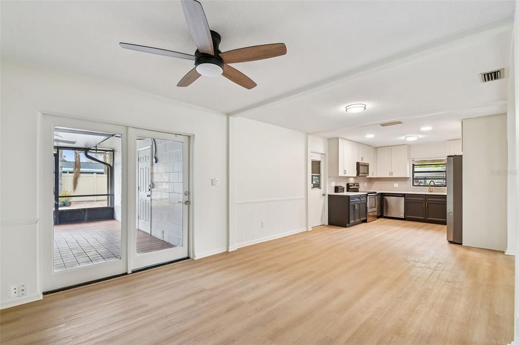 2708 Lion Heart Road Winter Park, FL 32792 - Photo 8 of 47 a view of a kitchen with a sink and a refrigerator