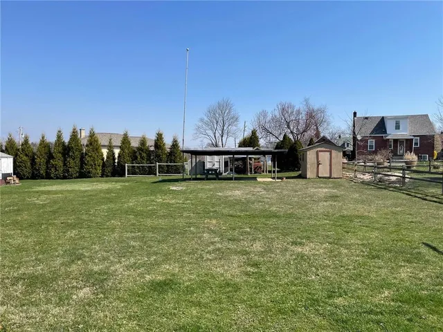 a view of a house with a garden