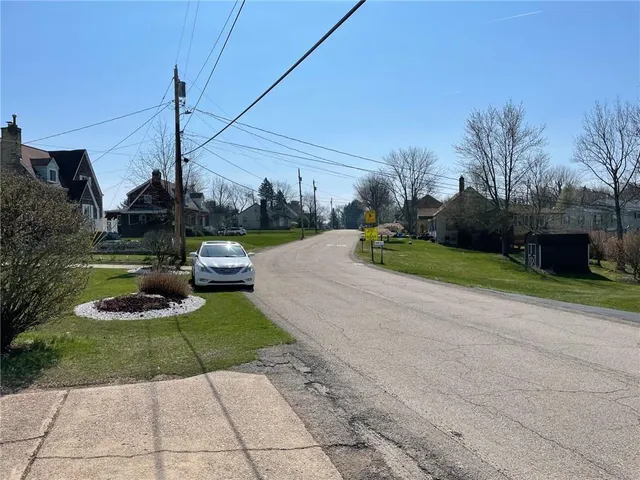 a view of a street with houses