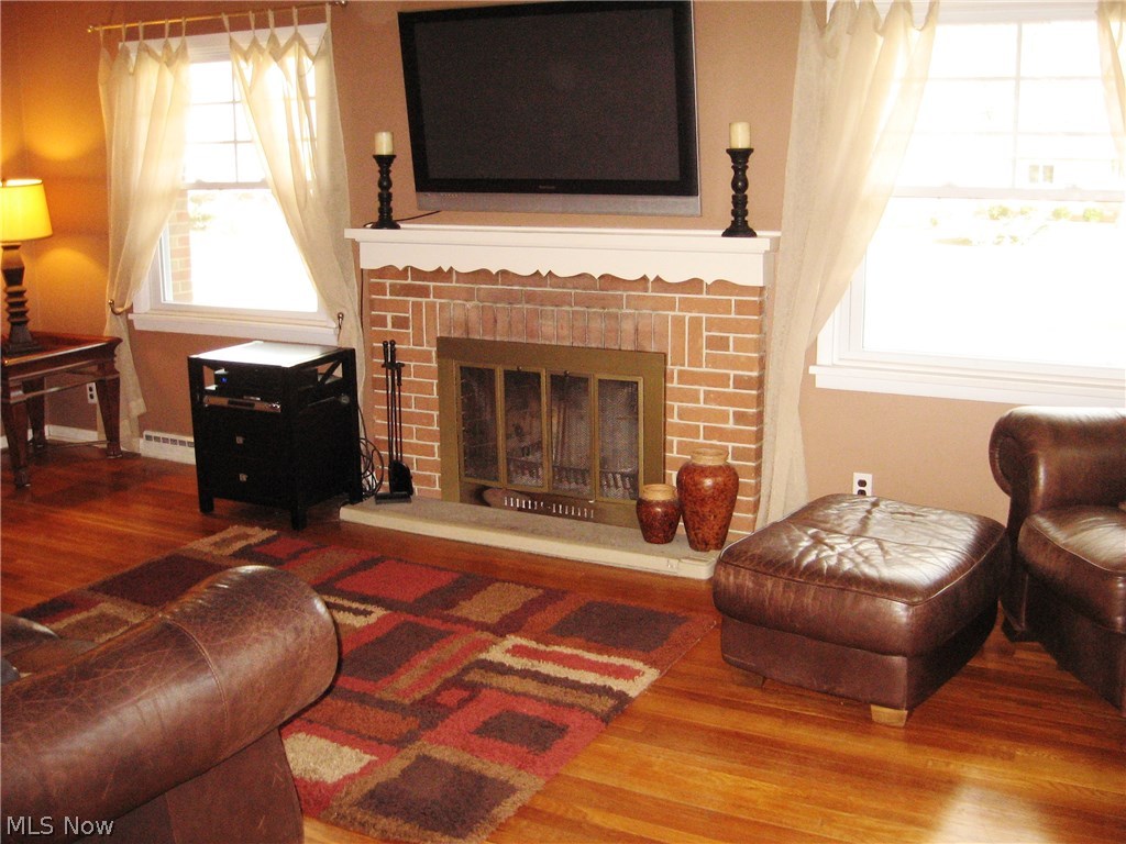 3792 Baird Road Stow, OH 44224 - Photo 4 of 24 Wood burning fireplace in living room.