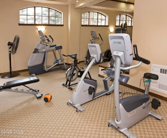 a view of a livingroom with furniture and a fireplace