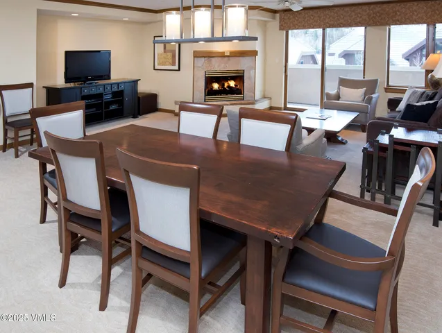a kitchen with a refrigerator and a sink