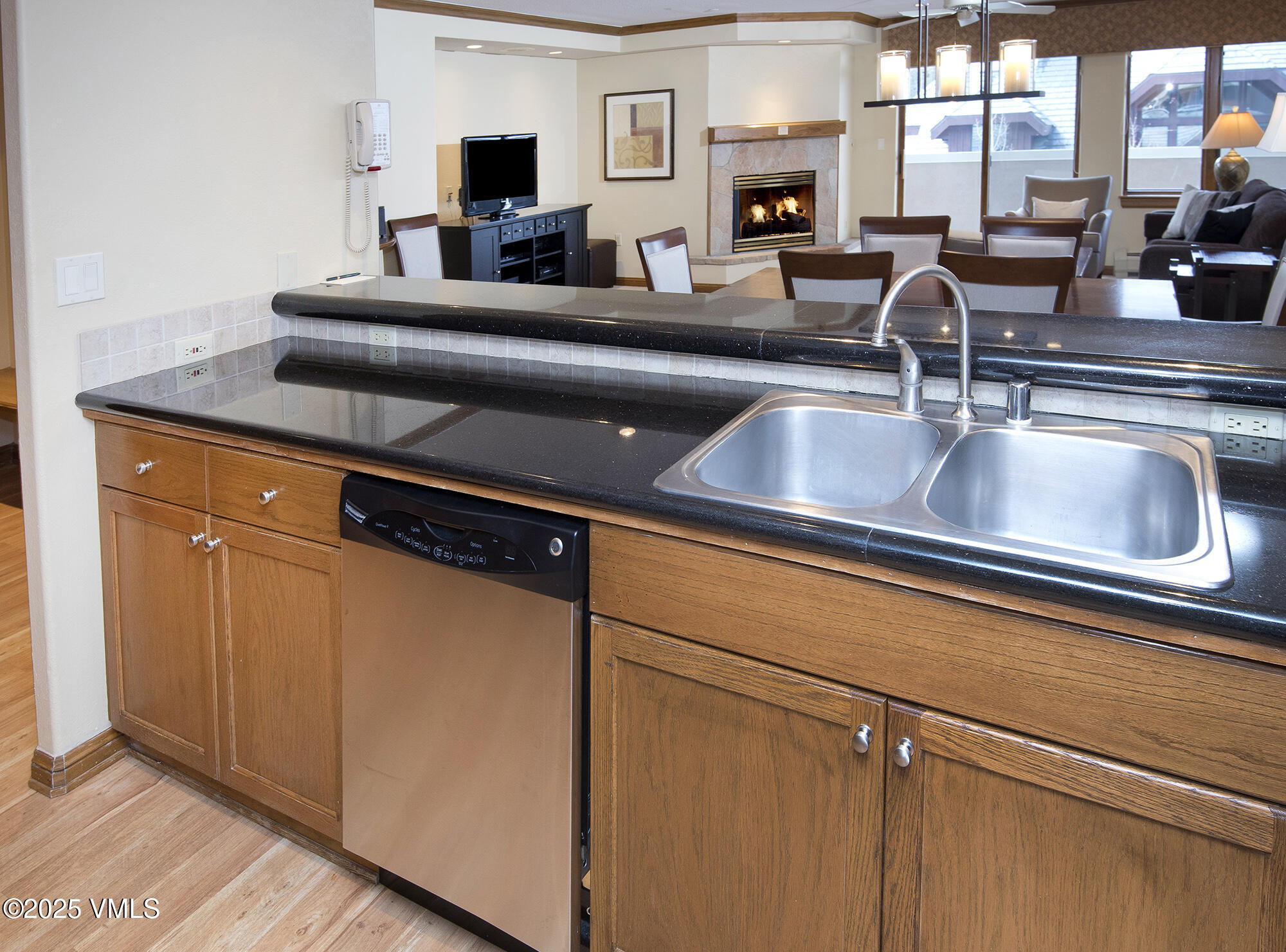 210 Offerson Road Beaver Creek, CO 81620 - Photo 19 of 30 a kitchen with a sink and a refrigerator