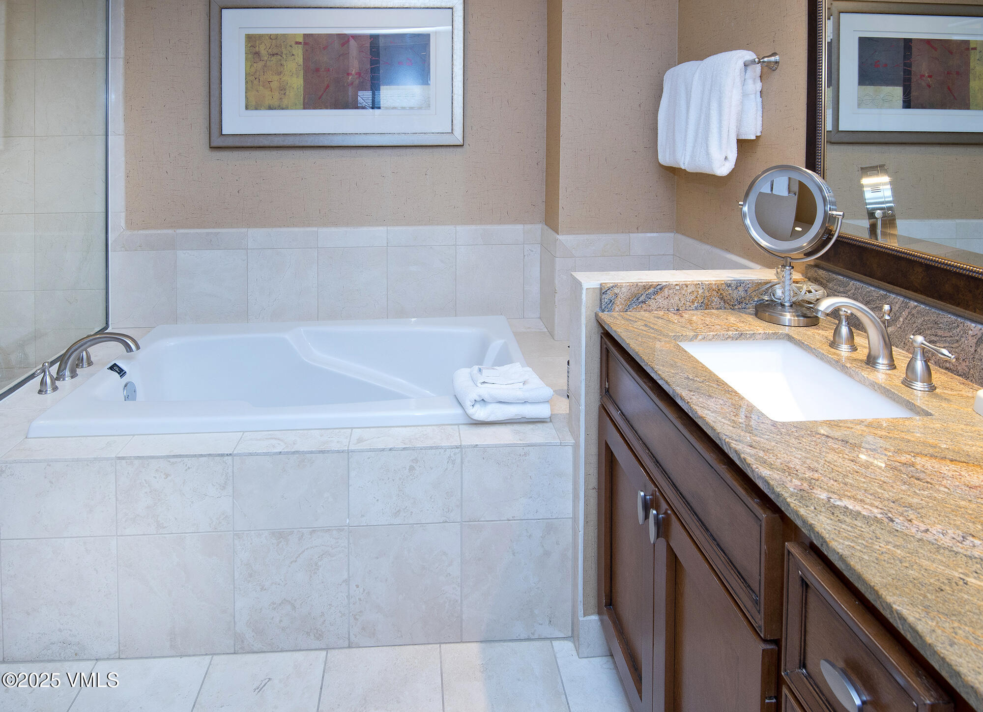 210 Offerson Road Beaver Creek, CO 81620 - Photo 26 of 30 a bathroom with a granite countertop bathtub sink and mirror