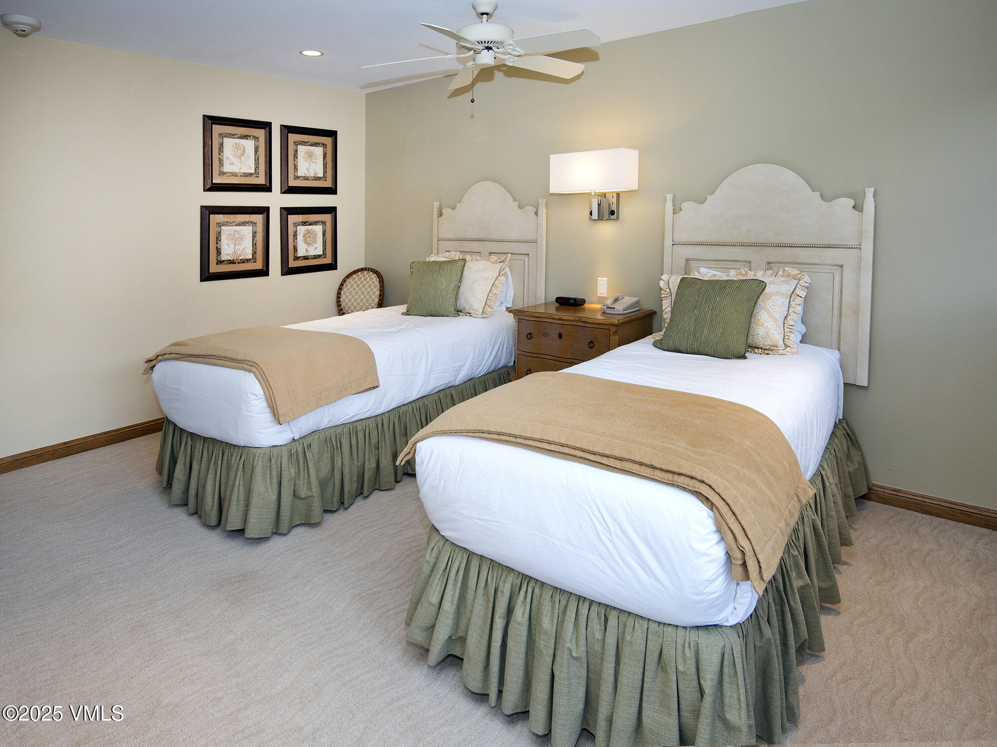 210 Offerson Road Beaver Creek, CO 81620 - Photo 29 of 30 a bedroom with bed and a painting on the wall